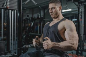 a-muscular-man-in-a-black-tank-top